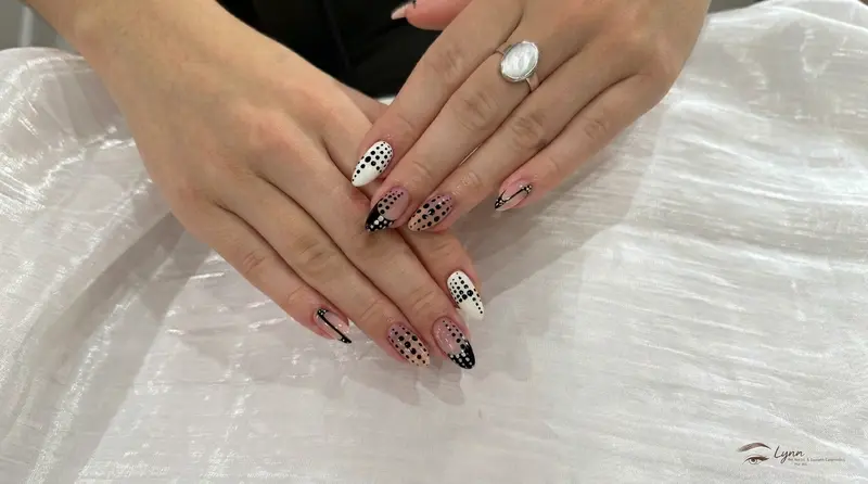 Trendy pastel gel nails with art detail at Lynn Salon Hoi An